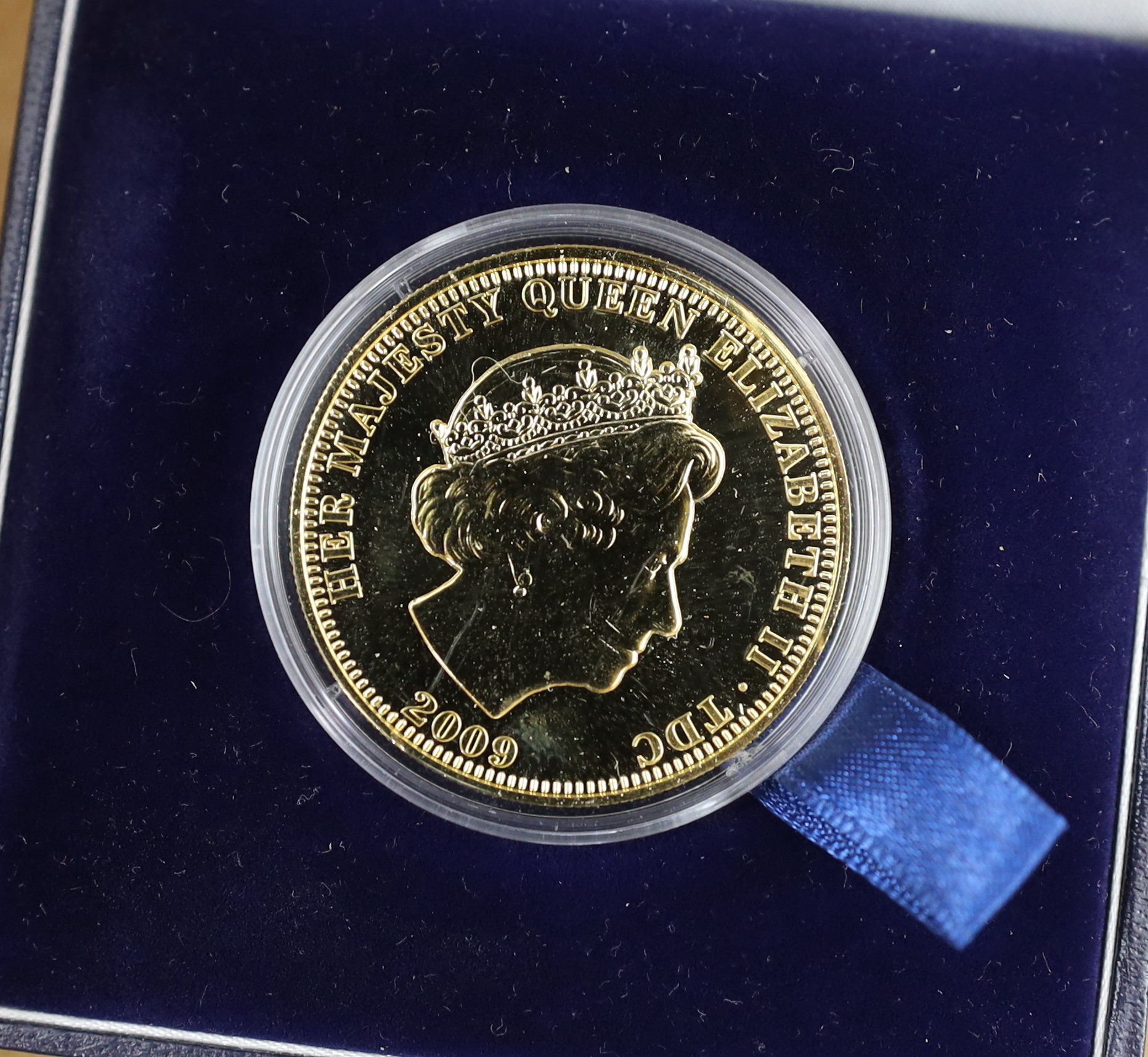 QEII and modern commemorative proof silver coins - Jersey 2014 2oz. ‘100 poppies’ coin, the First World War Centenary 2oz. numisproof, two London Mint 2009 Tristan de Cunha £5 coins, Royal Mint 2009 countdown XXX Olympia